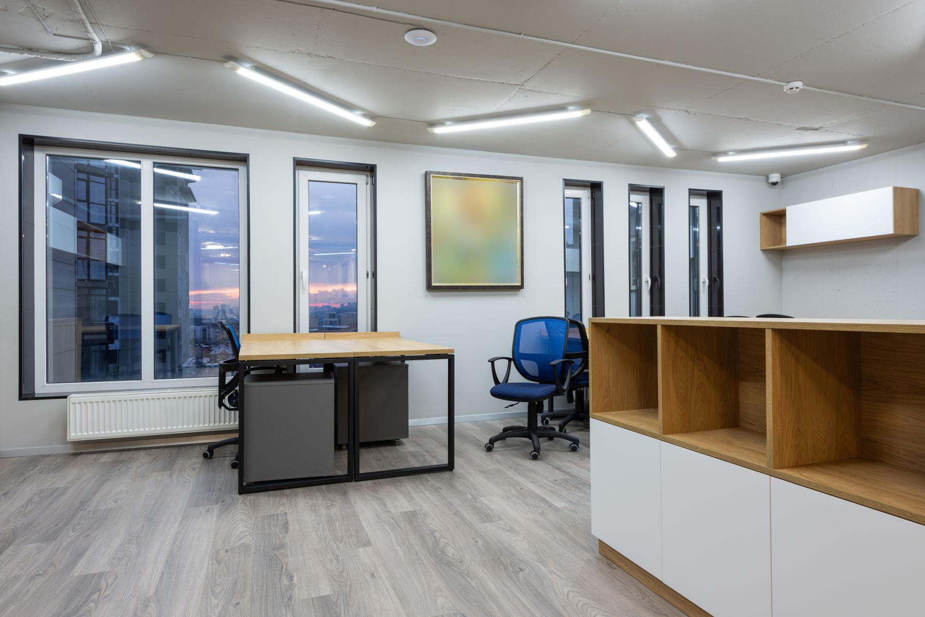 A completed commercial interior fit-out with open workspace